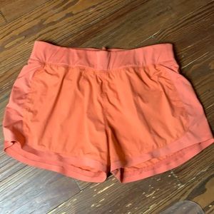 Athleta orange athletic running shorts L